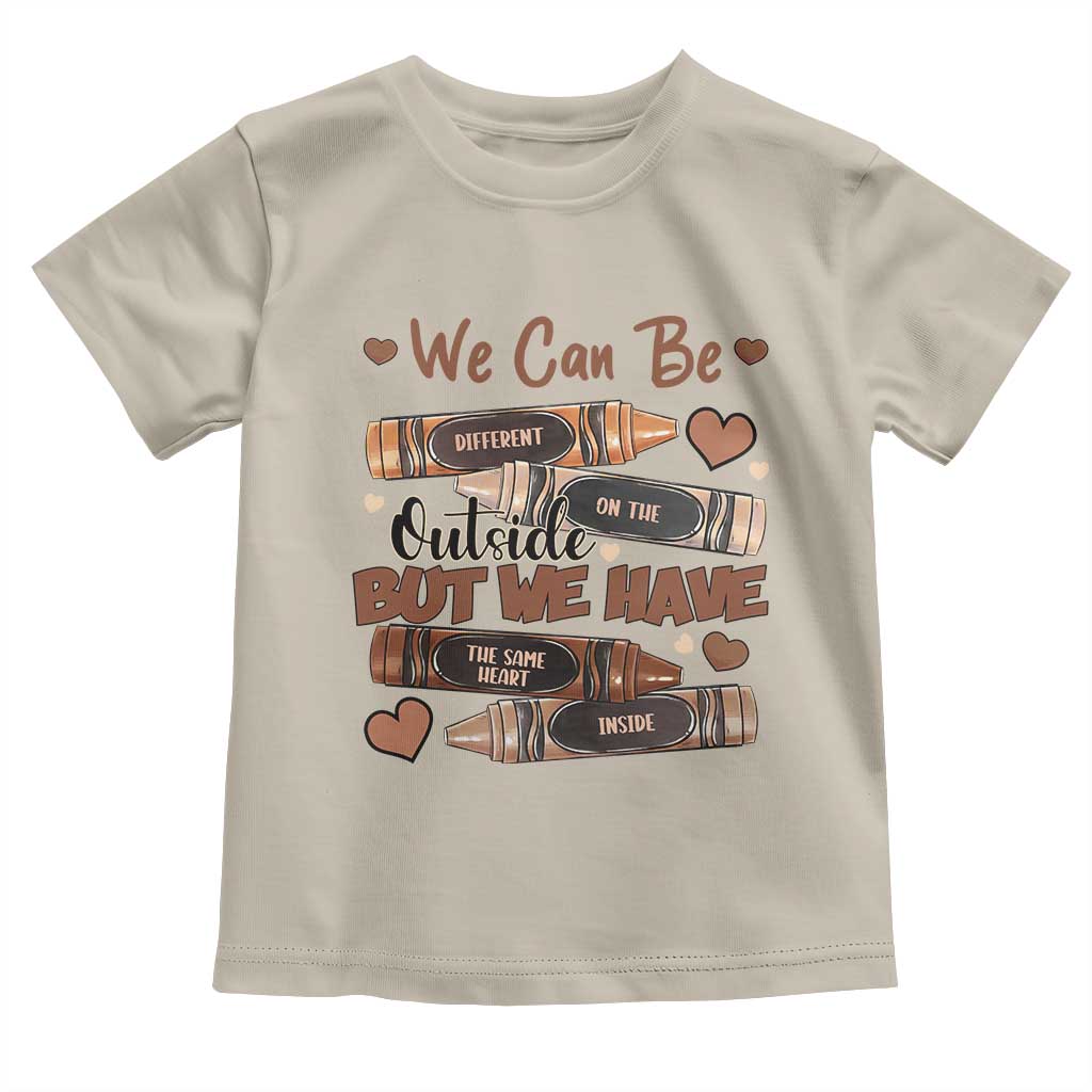 African American Teacher Toddler T Shirt We Can Be Different On The Outside But We Have The Same Heart Inside Melanin Crayons TS11 Sand Print Your Wear