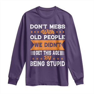 Funny Dont Mess With Old People We Didnt Get This Age By Being Stupid Long Sleeve Shirt TS11 Purple Print Your Wear