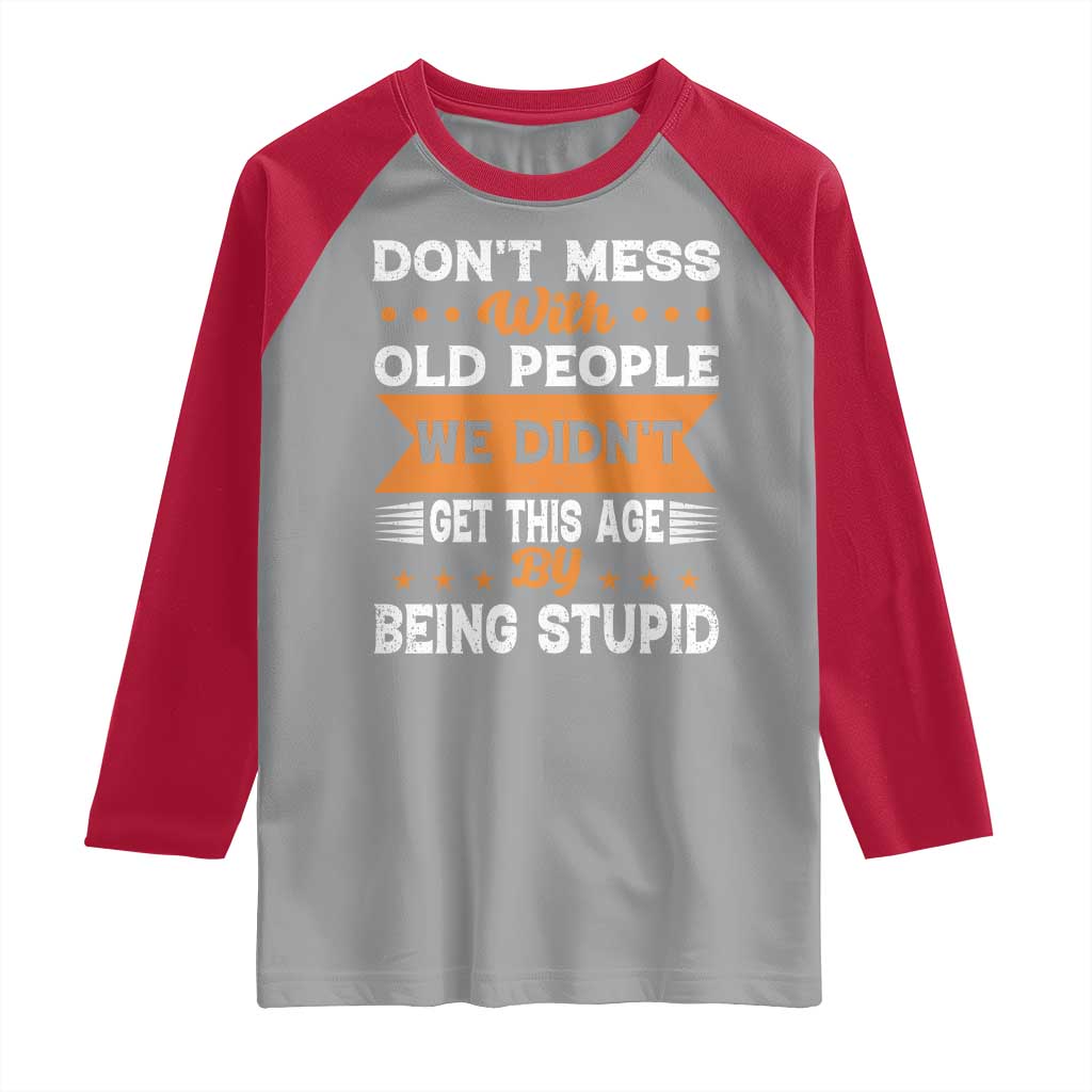 Funny Dont Mess With Old People We Didnt Get This Age By Being Stupid Raglan Shirt TS11 Sport Gray Red Print Your Wear
