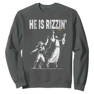 Funny Jesus American Football He Is Rizzin' Sweatshirt TS11 Dark Heather Print Your Wear