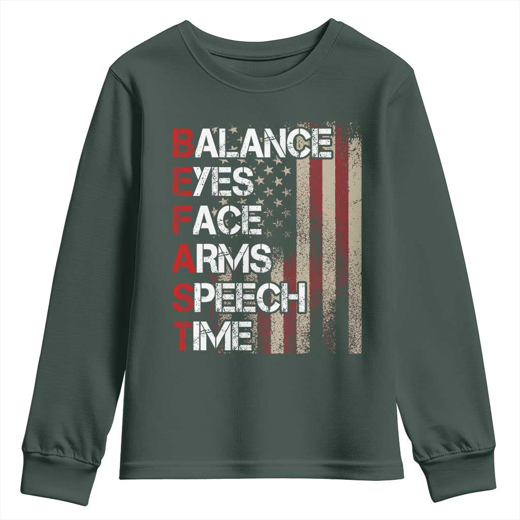 Stroke Awareness Youth Sweatshirt BEFAST Stroke Symptoms Vintage American Flag TS11 Dark Forest Green Print Your Wear