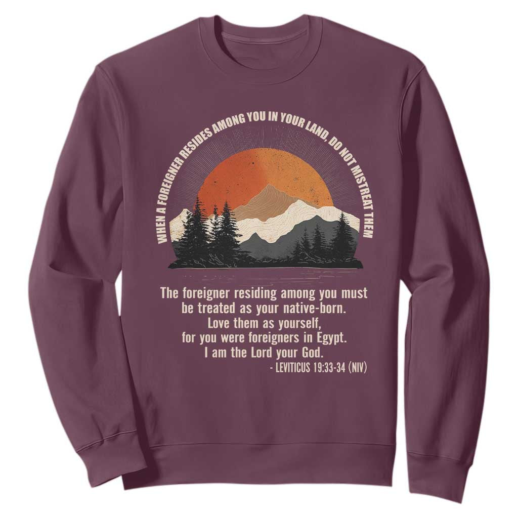 When A Foreigner Resides Among You In Your Land Do Not Mistreat Them Sweatshirt Leviticus Bible Verse TS11 Maroon Print Your Wear