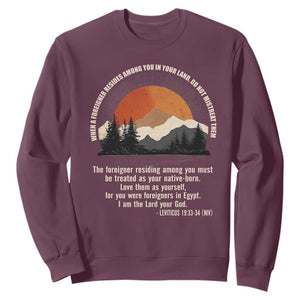 When A Foreigner Resides Among You In Your Land Do Not Mistreat Them Sweatshirt Leviticus Bible Verse TS11 Maroon Print Your Wear