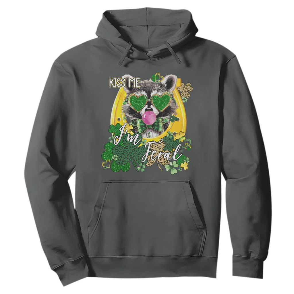 Funny St Patrick's Day Racoon Hoodie Kiss Me I'm Feral Horseshoe Shamrock TS11 Dark Heather Print Your Wear