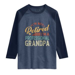 I Am Not Retired I Am A Professional Grandpa Raglan Shirt Funny Retirement Grandfather Father's Day TS11 Heather Denim Navy Print Your Wear