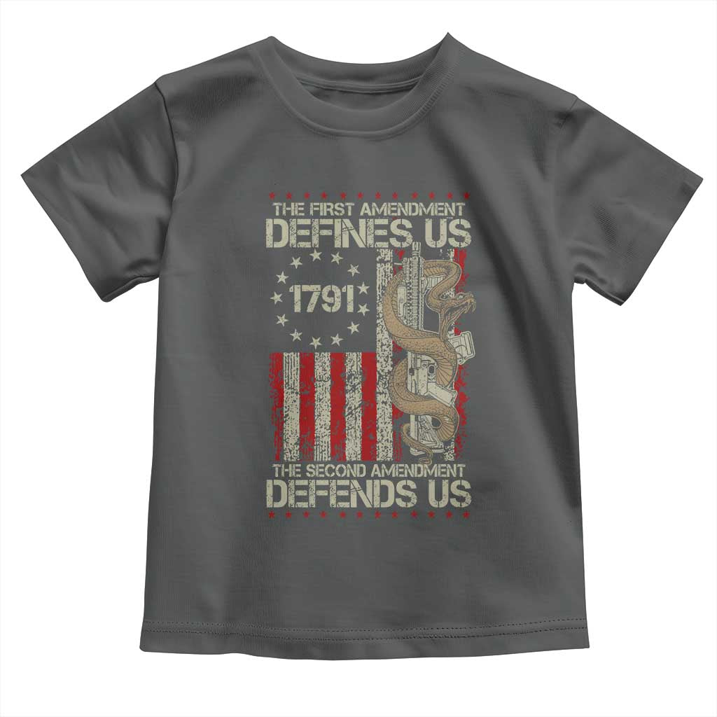 The First Amendment Defines Us The Second Defend Us Toddler T Shirt Vintage American Flag TS11 Dark Heather Print Your Wear