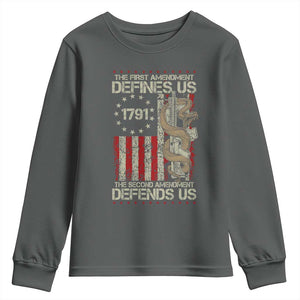 The First Amendment Defines Us The Second Defend Us Youth Sweatshirt Vintage American Flag TS11 Dark Heather Print Your Wear