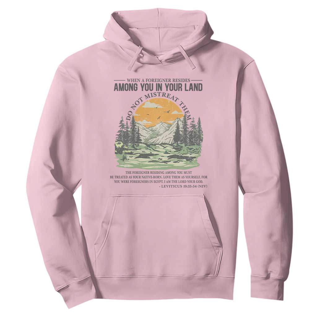 When A Foreigner Resides Among You In Your Land Do Not Mistreat Them Hoodie Bible Verse TS11 Light Pink Print Your Wear