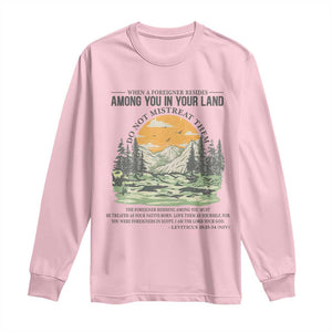 When A Foreigner Resides Among You In Your Land Do Not Mistreat Them Long Sleeve Shirt Bible Verse TS11 Light Pink Print Your Wear