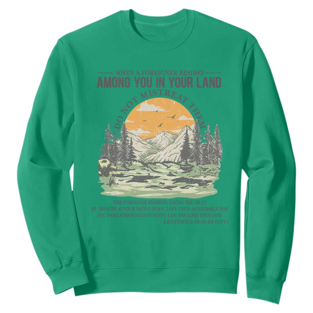 When A Foreigner Resides Among You In Your Land Do Not Mistreat Them Sweatshirt Bible Verse TS11 Irish Green Print Your Wear