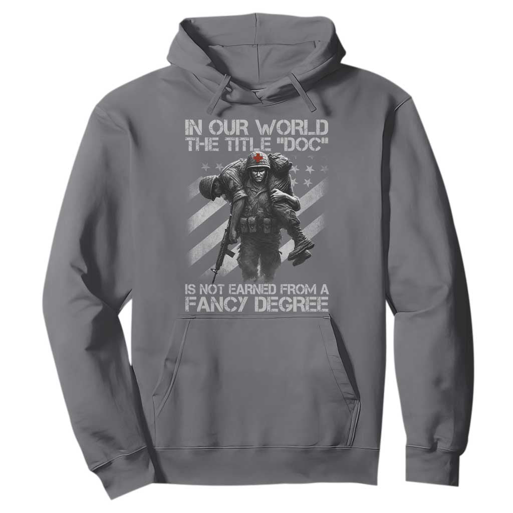 Combat Medic Hoodie In Our World The Title Doc Is Not Earned Form A Fancy Degree TS11 Charcoal Print Your Wear