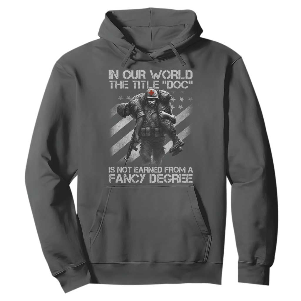 Combat Medic Hoodie In Our World The Title Doc Is Not Earned Form A Fancy Degree TS11 Dark Heather Print Your Wear