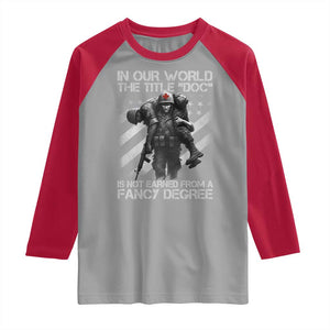 Combat Medic Raglan Shirt In Our World The Title Doc Is Not Earned Form A Fancy Degree TS11 Sport Gray Red Print Your Wear