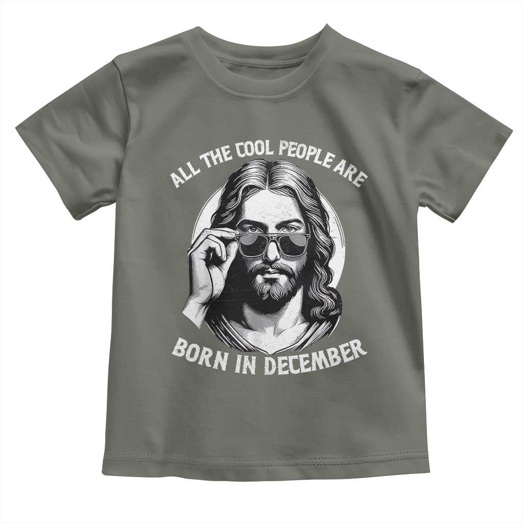 All The Cool People Are Born In December Toddler T Shirt Funny Christmas December Birthday Jesus TS11 Military Green Print Your Wear