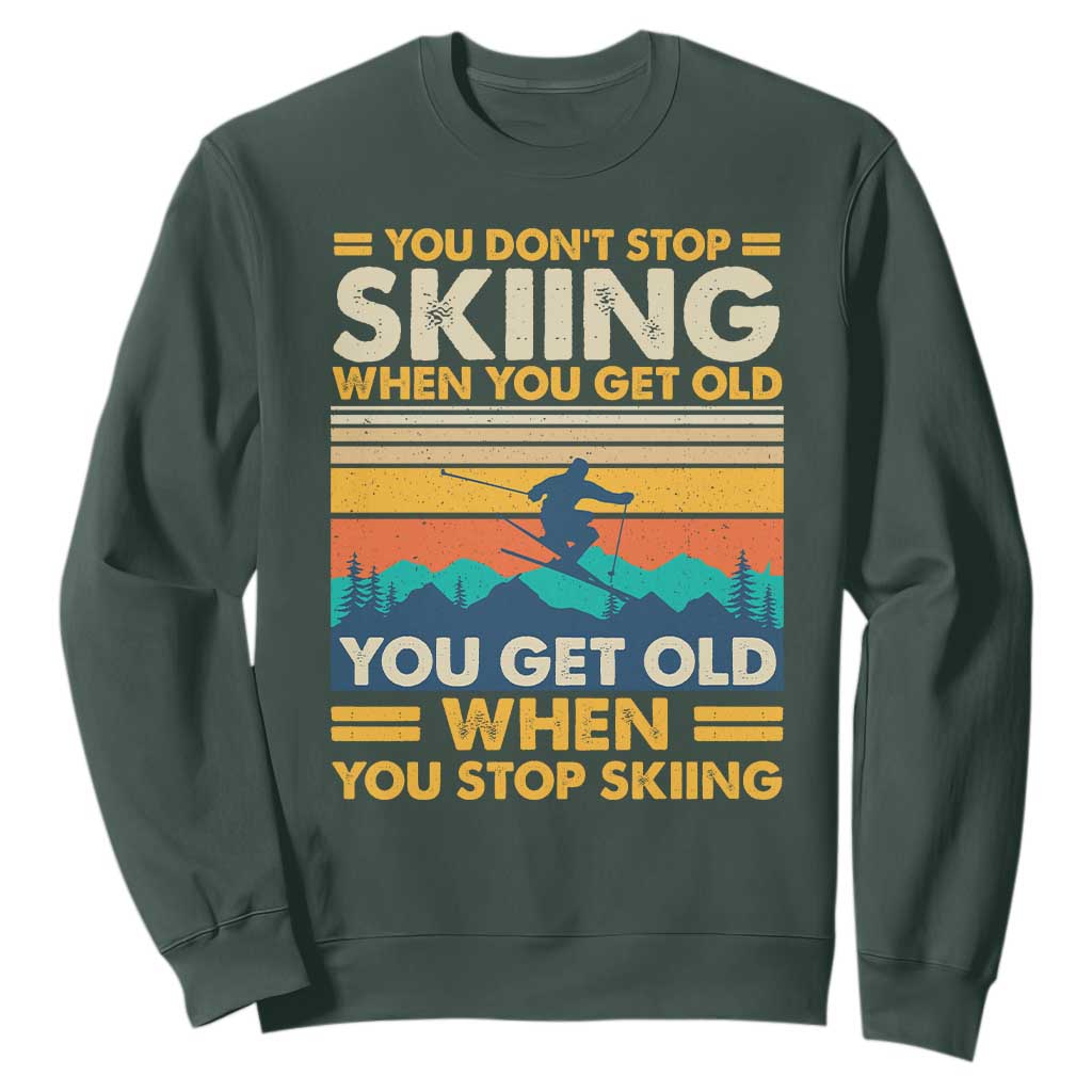 Funny You Dont Stop Skiing When You Get Old You Get Old When You Stop Skiing Sweatshirt TS11 Dark Forest Green Print Your Wear