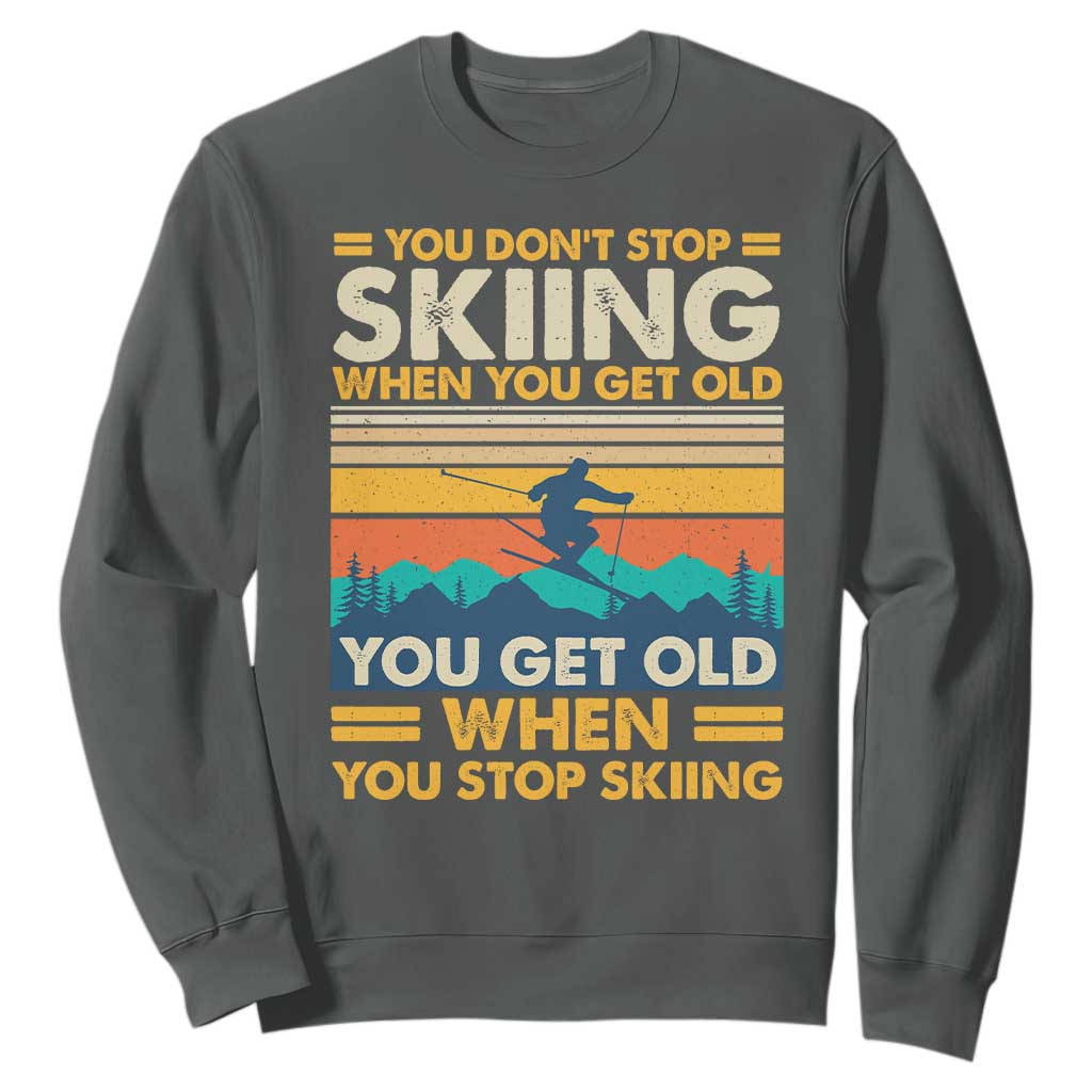 Funny You Dont Stop Skiing When You Get Old You Get Old When You Stop Skiing Sweatshirt TS11 Dark Heather Print Your Wear