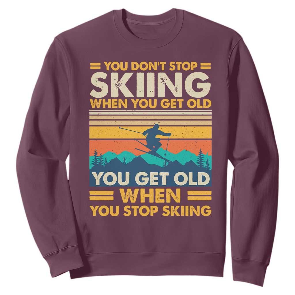 Funny You Dont Stop Skiing When You Get Old You Get Old When You Stop Skiing Sweatshirt TS11 Maroon Print Your Wear