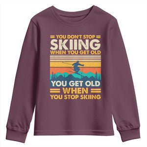 Funny You Dont Stop Skiing When You Get Old You Get Old When You Stop Skiing Youth Sweatshirt TS11 Maroon Print Your Wear