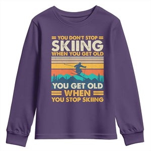 Funny You Dont Stop Skiing When You Get Old You Get Old When You Stop Skiing Youth Sweatshirt TS11 Purple Print Your Wear