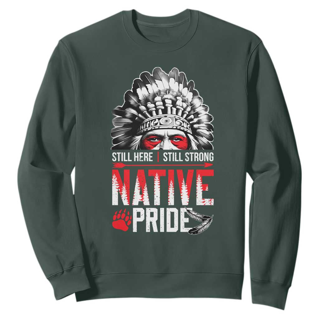 Still Here Still Strong Native Pride Sweatshirt Native American Feather TS11 Dark Forest Green Print Your Wear