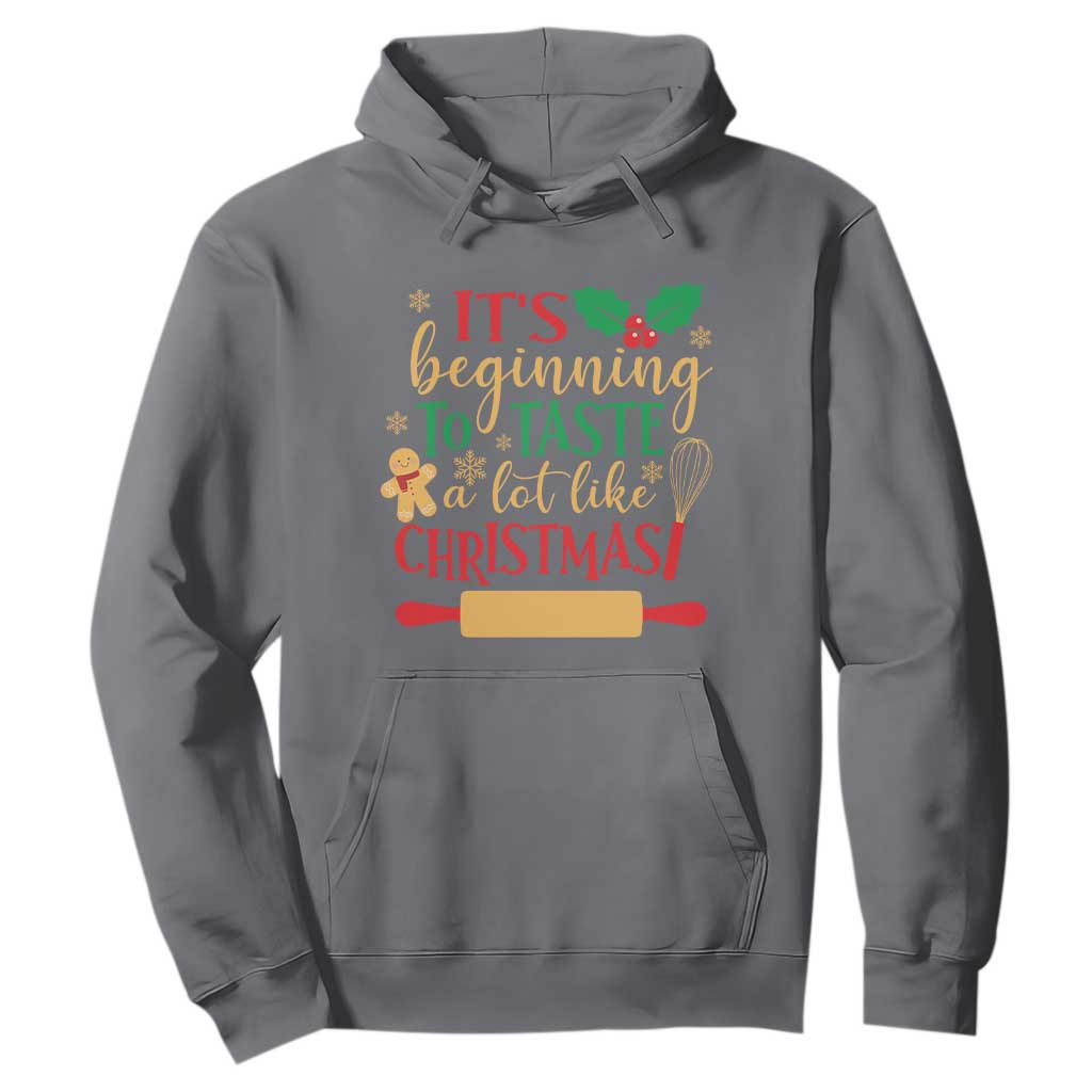 Funny Christmas Baker Hoodie It's Beginning To Taste A Lot Like Christmas Gingerbread TS11 Charcoal Print Your Wear