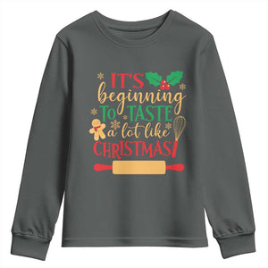 Funny Christmas Baker Youth Sweatshirt It's Beginning To Taste A Lot Like Christmas Gingerbread TS11 Dark Heather Print Your Wear