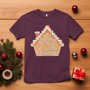 Funny Christmas Cookie Baking T Shirt It's Beginning To Taste A Lot Like Christmas Gingerbread House TS11 Maroon Print Your Wear