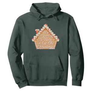 Funny Christmas Cookie Baking Hoodie It's Beginning To Taste A Lot Like Christmas Gingerbread House TS11 Dark Forest Green Print Your Wear