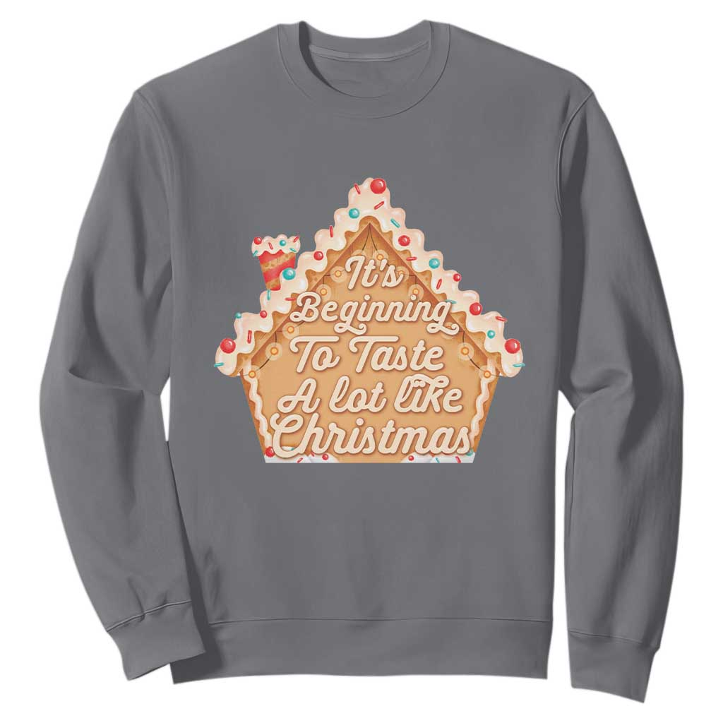 Funny Christmas Cookie Baking Sweatshirt It's Beginning To Taste A Lot Like Christmas Gingerbread House TS11 Charcoal Print Your Wear