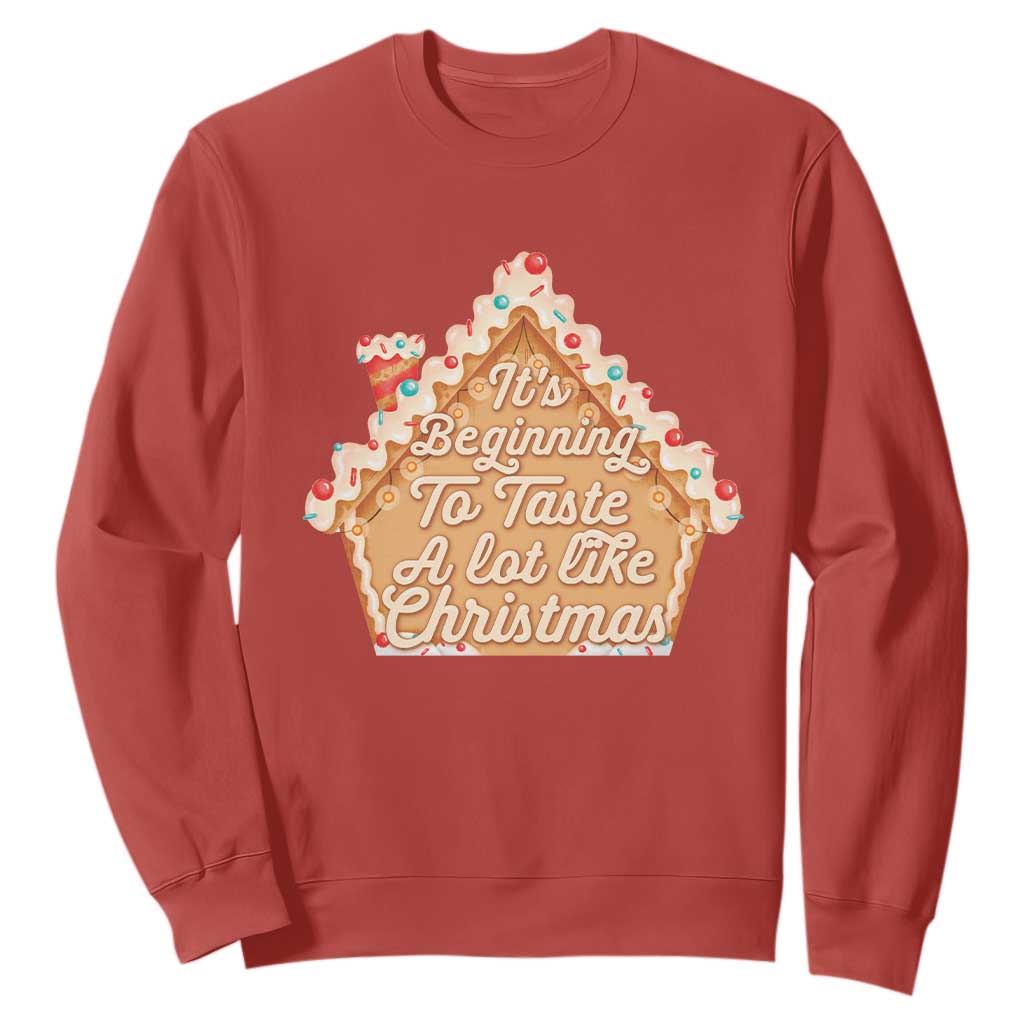 Funny Christmas Cookie Baking Sweatshirt It's Beginning To Taste A Lot Like Christmas Gingerbread House TS11 Red Print Your Wear