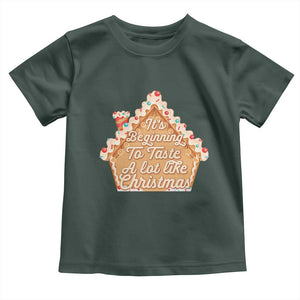 Funny Christmas Cookie Baking Toddler T Shirt It's Beginning To Taste A Lot Like Christmas Gingerbread House TS11 Dark Forest Green Print Your Wear