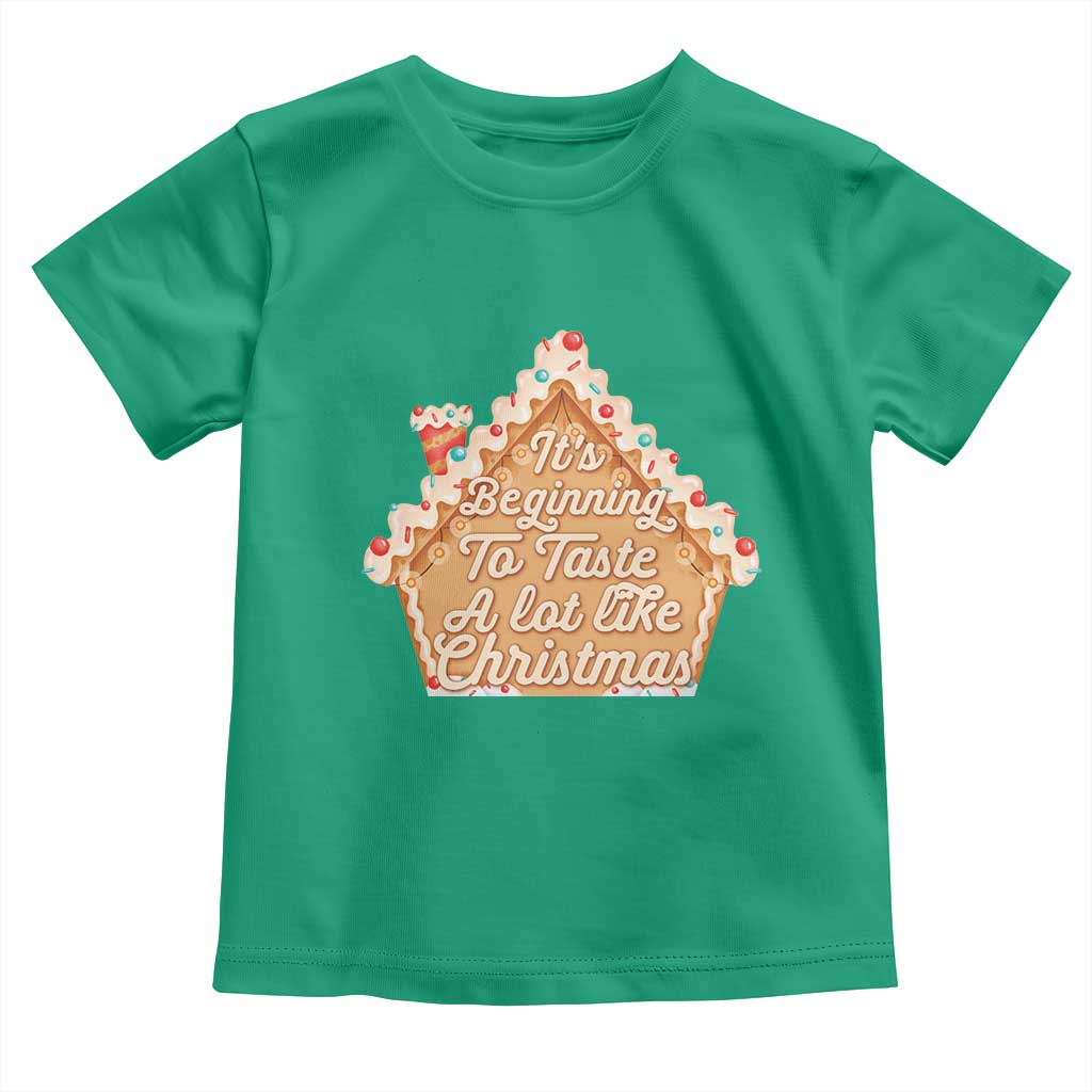 Funny Christmas Cookie Baking Toddler T Shirt It's Beginning To Taste A Lot Like Christmas Gingerbread House TS11 Irish Green Print Your Wear