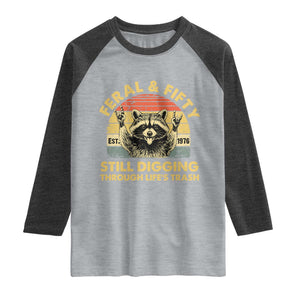 50th Birthday Raccoon Raglan Shirt Feral And Fifty Still Digging Through Life's Trash Est 1976 TS11 Heather Gray Heather Charcoal Print Your Wear