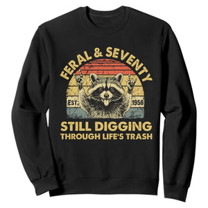 70th Birthday Raccoon Sweatshirt Feral And Seventy Still Digging Through Life's Trash Est 1956 TS11 Black Print Your Wear