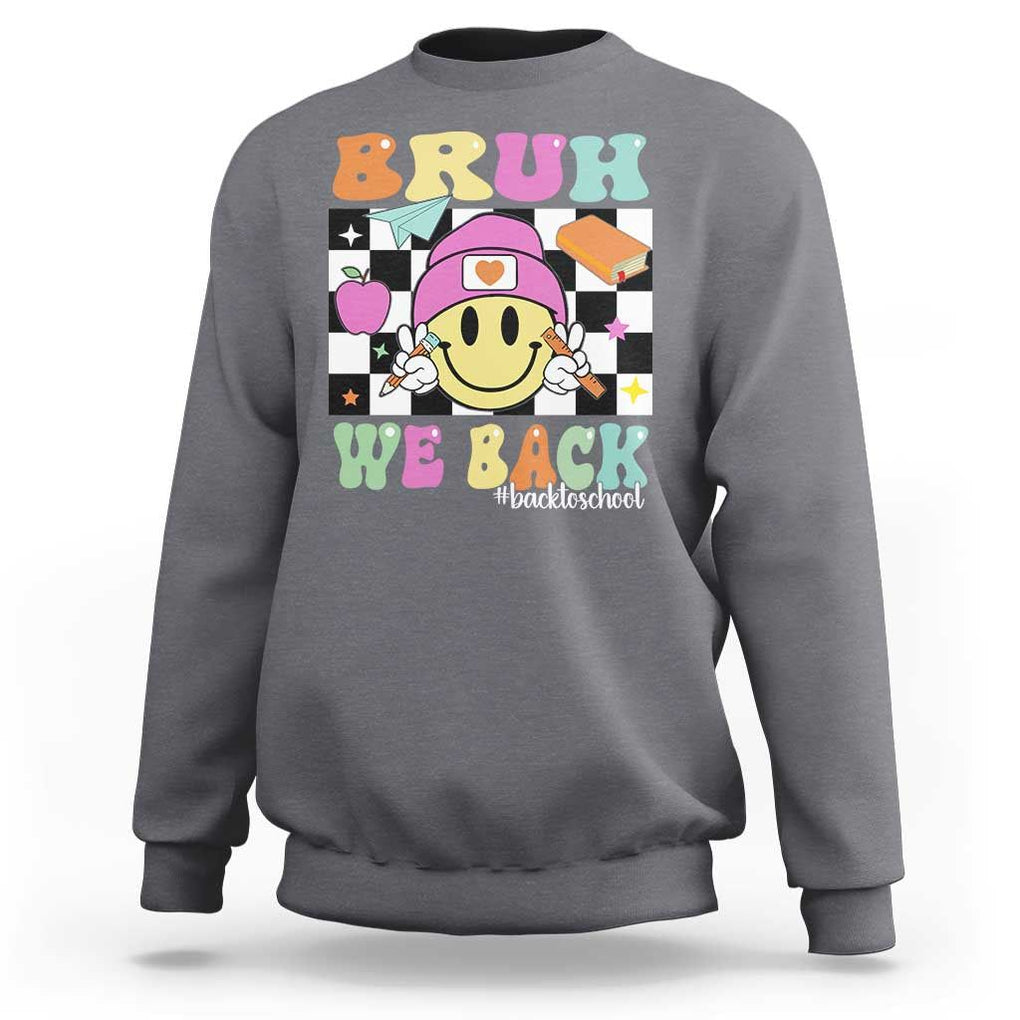 Bruh We Back Sweatshirt Back To School Retro Groovy Smiley Face TS11 Charcoal Print Your Wear