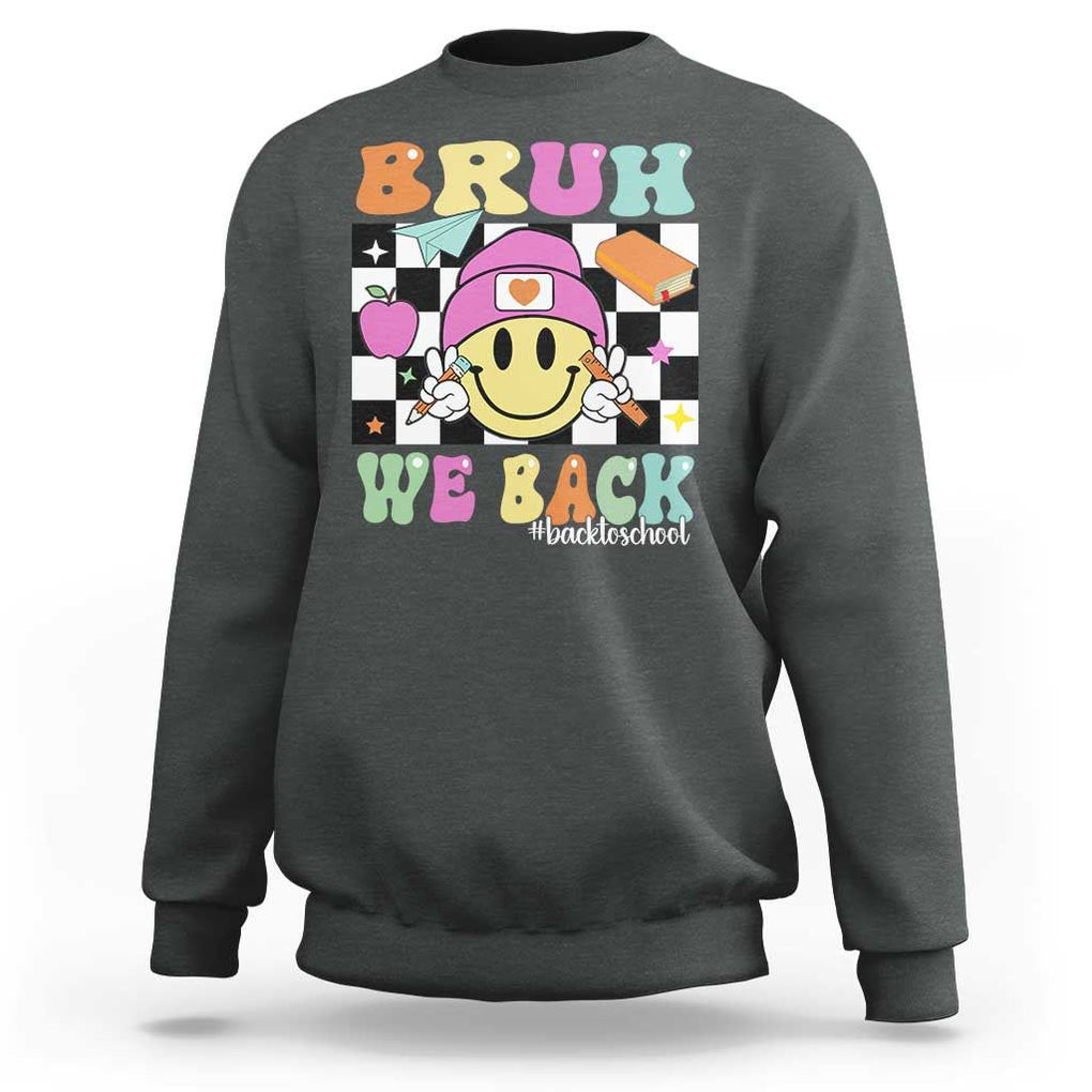 Bruh We Back Sweatshirt Back To School Retro Groovy Smiley Face TS11 Dark Heather Print Your Wear