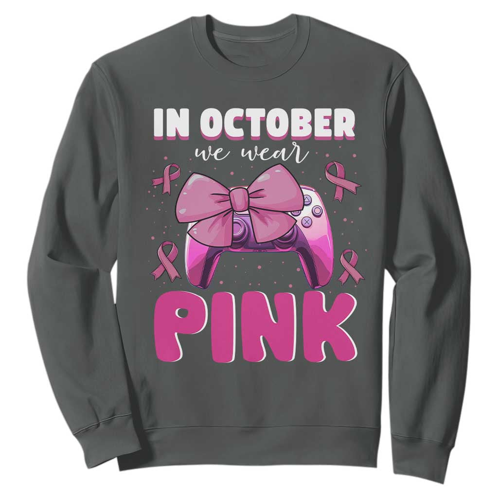 In October We Wear Pink Sweatshirt Breast Cancer Awareness Game Console Pink Bow TS11 Dark Heather Print Your Wear