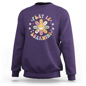 Play Is Learning Sweatshirt Teachers Inspirational Retro Groovy Daisy TS11 Purple Print Your Wear