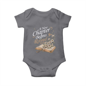 A New Chapter Begins Retired 2026 Baby Onesie Retired Teacher Floral Book TS11 Charcoal Print Your Wear