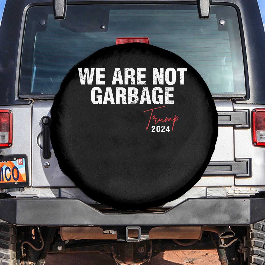 Funny Trump Garbage Spare Tire Cover We're Not Garbage Trump 2024 TS11 No hole Black Print Your Wear