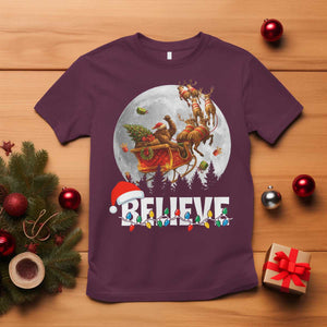 Funny Bigfoot Christmas T Shirt Believe Santa Sasquatch Xmas Reindeer Sleigh TS11 Maroon Print Your Wear