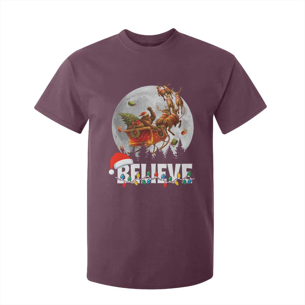 Funny Bigfoot Christmas T Shirt For Kid Believe Santa Sasquatch Xmas Reindeer Sleigh TS11 Maroon Print Your Wear