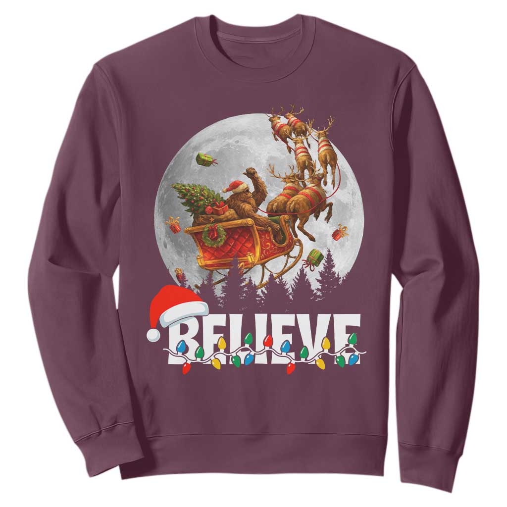 Funny Bigfoot Christmas Sweatshirt Believe Santa Sasquatch Xmas Reindeer Sleigh TS11 Maroon Print Your Wear