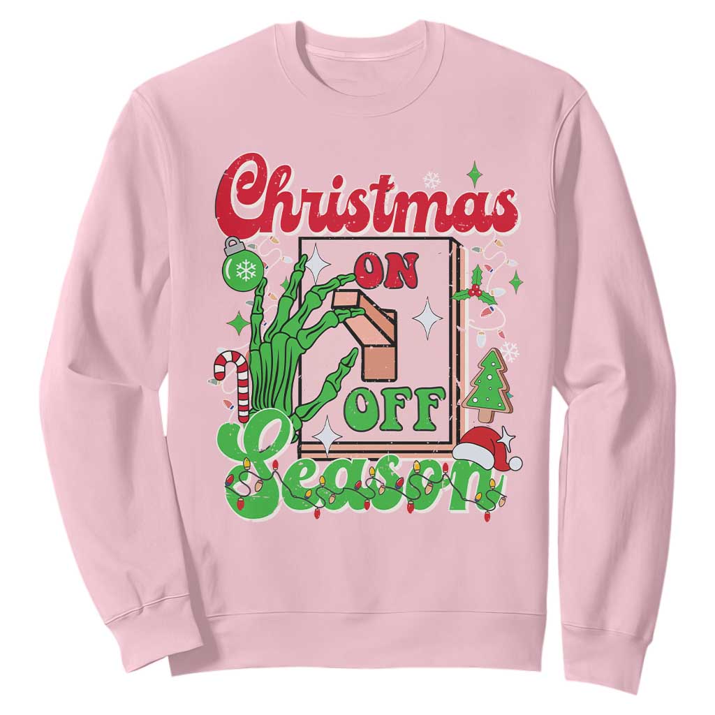 Funny Christmas Season Sweatshirt Switch Red And Green Skeleton Hand TS11 Light Pink Print Your Wear