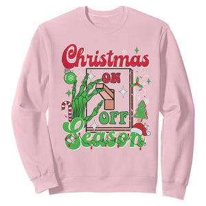 Funny Christmas Season Sweatshirt Switch Red And Green Skeleton Hand TS11 Light Pink Print Your Wear