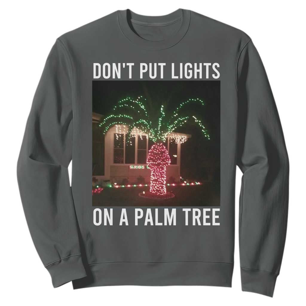 Funny Christmas Dont Put Lights On A Palm Tree Sweatshirt Xmas Lights Palm Tree Meme TS11 Dark Heather Print Your Wear