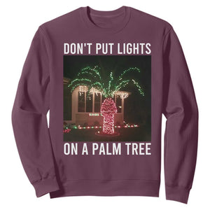 Funny Christmas Dont Put Lights On A Palm Tree Sweatshirt Xmas Lights Palm Tree Meme TS11 Maroon Print Your Wear