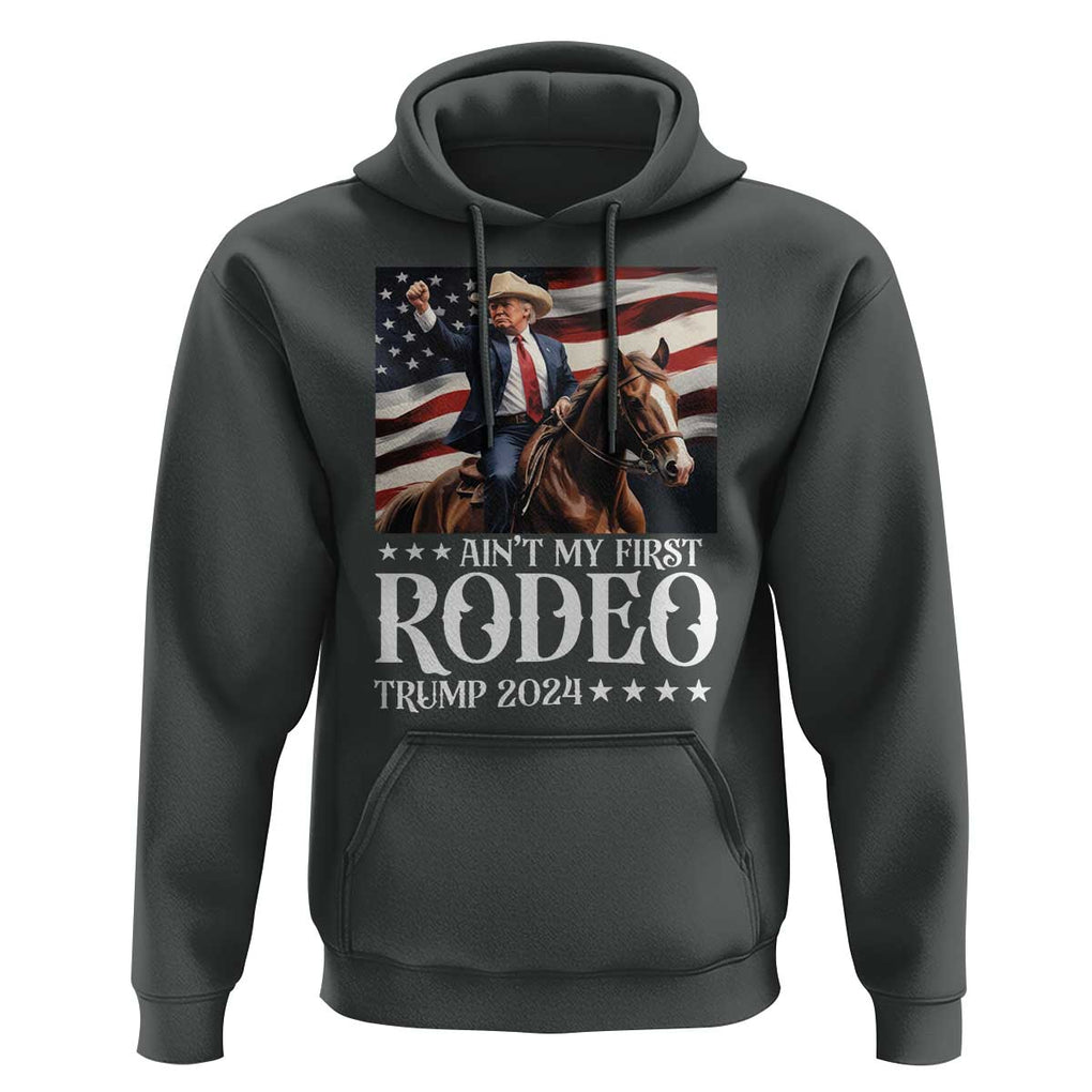 Funny Ain't My First Rodeo Trump 2024 Hoodie Western Cowboy American Flag TS11 Dark Heather Print Your Wear
