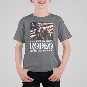Funny Ain't My First Rodeo Trump 2024 T Shirt For Kid Western Cowboy American Flag TS11 Charcoal Print Your Wear