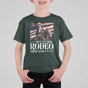 Funny Ain't My First Rodeo Trump 2024 T Shirt For Kid Western Cowboy American Flag TS11 Dark Forest Green Print Your Wear
